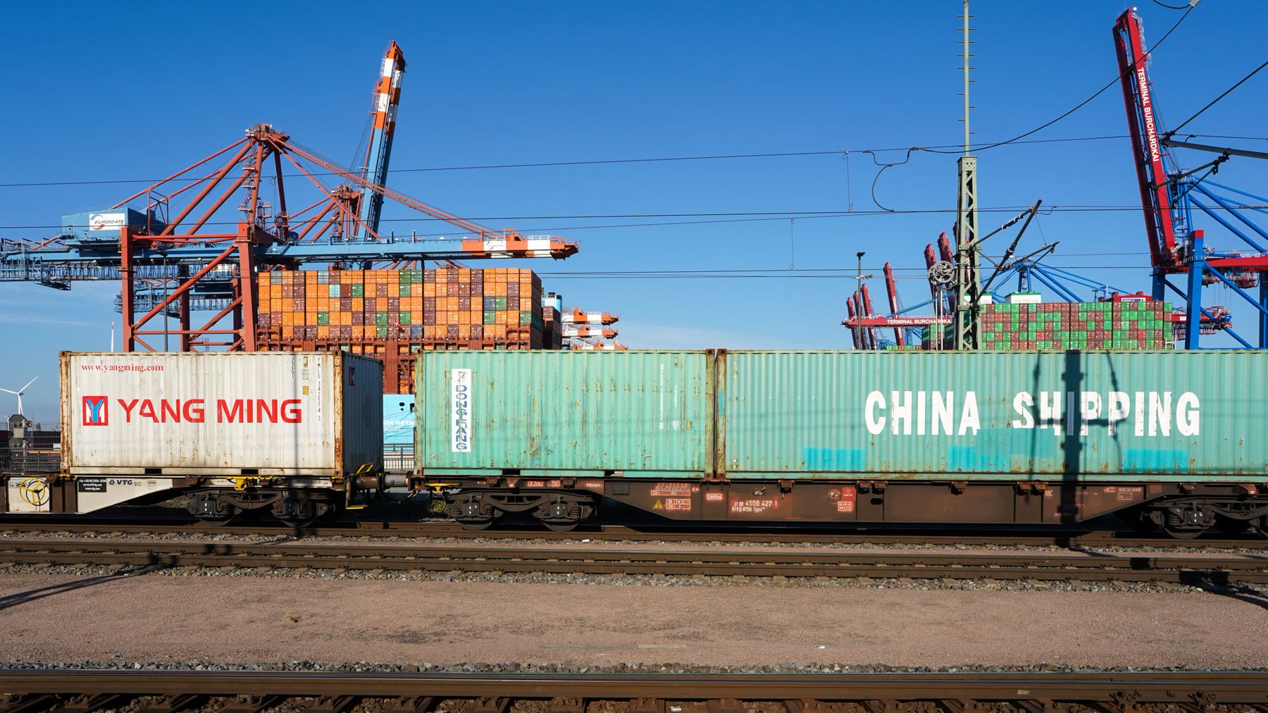 Intermodal containers transported by freight train
